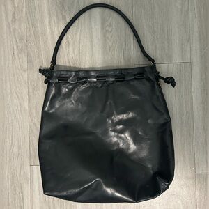 Claire V black leather large drawstring bag